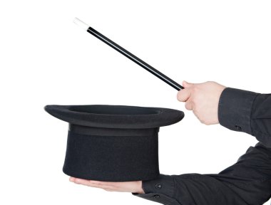 Hands of the magician with magic wand and top hat clipart