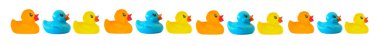 Many ducks toy of different colors clipart