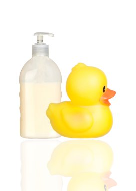 Yellow plastic duck and boat bath dispenser isolated clipart