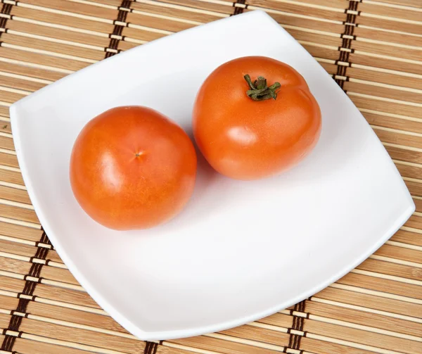 Rajčata v destičce — Stock fotografie