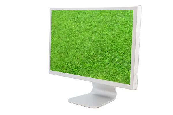 緑の草のイメージとコンピューター モニター — ストック写真