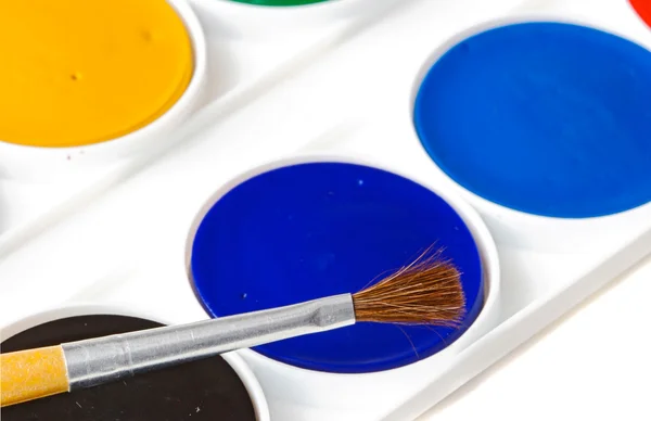 Box of watercolors with brush — Stock Photo, Image