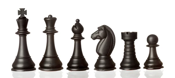 stock image Black chess pieces in order of decreasing