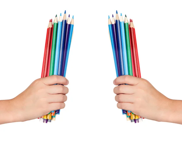 Δύο χέρια που κρατούν πολλά χρωματιστά μολύβια — Φωτογραφία Αρχείου