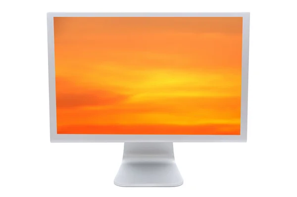 Moniteur d'ordinateur avec un ciel orange — Photo