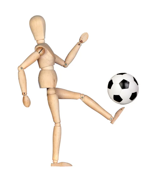 Дерев'яний маннекін з футбольним м'ячем — стокове фото