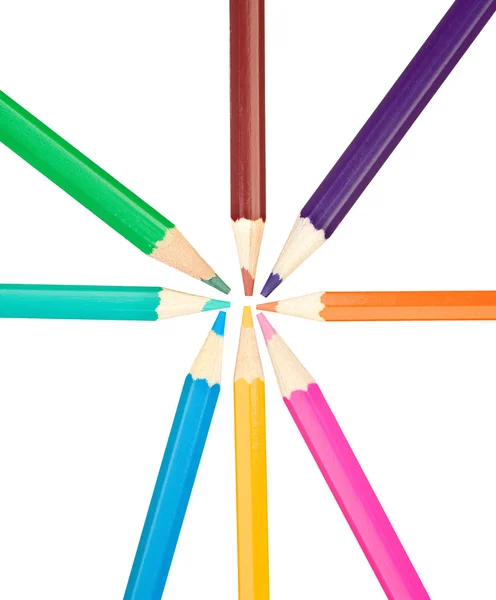 Colored pencils arranged in a star shape — Stock Photo, Image