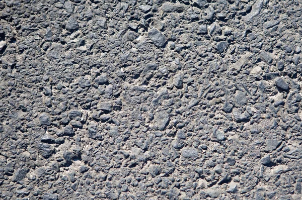 Una foto de textura áspera de piedra — Foto de Stock