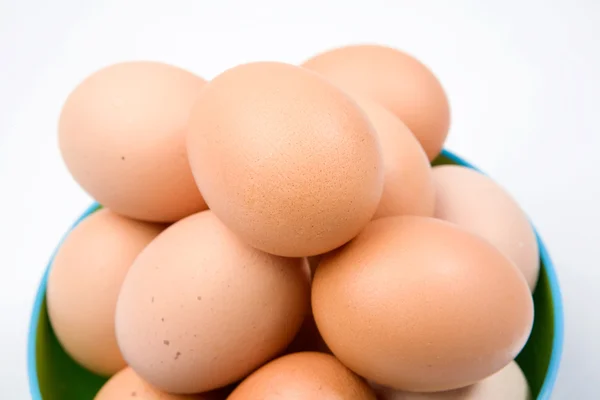 Photo of bowl with many brown hen eggs — Stock Photo, Image