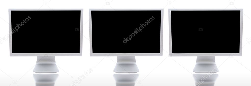 Three monitors of computers