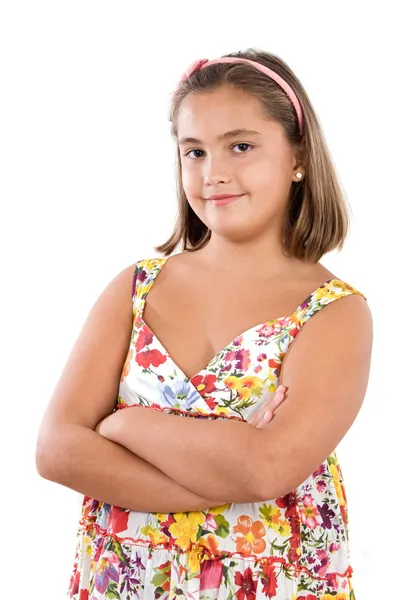 Schattig meisje met bloemrijke jurk — Stockfoto