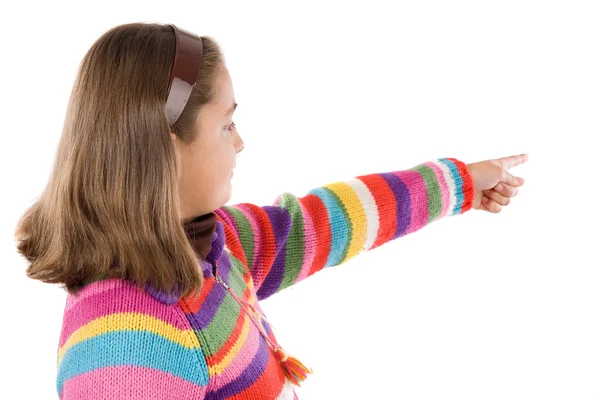 Adorable girl with woollen jacket pointing — Stock Photo, Image
