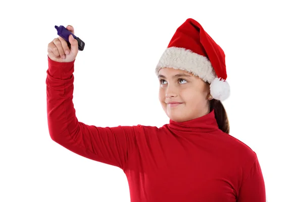 Красивая девушка в рождественской шляпе пишет — стоковое фото
