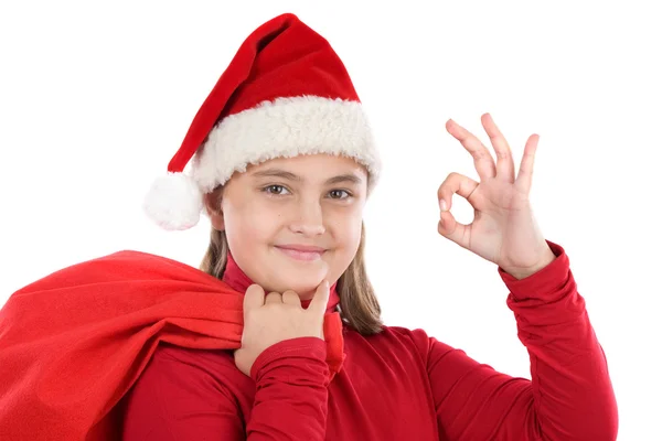 Menina bonita com chapéu de Natal dizendo OK — Fotografia de Stock