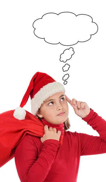 Beautiful girl with hat of Santa Claus thinking — Stock Photo, Image