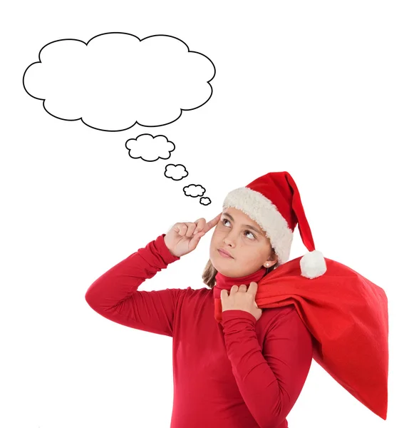 Beautiful girl with hat of Santa Claus thinking — Stock Photo, Image