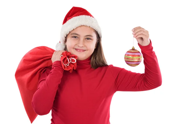 Красивая девушка с красным шаром Рождества — стоковое фото