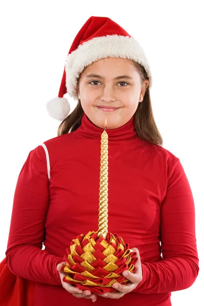 Красивая девушка со свечой Рождества — стоковое фото