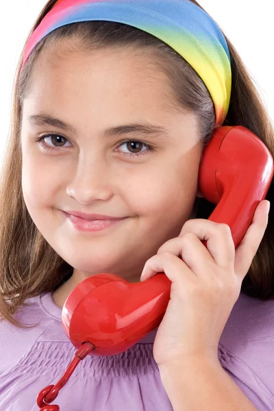 Beautiful girl with red telephone — Stock Photo, Image