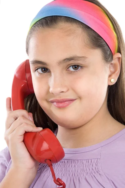 Красива дівчина з червоним телефоном — стокове фото
