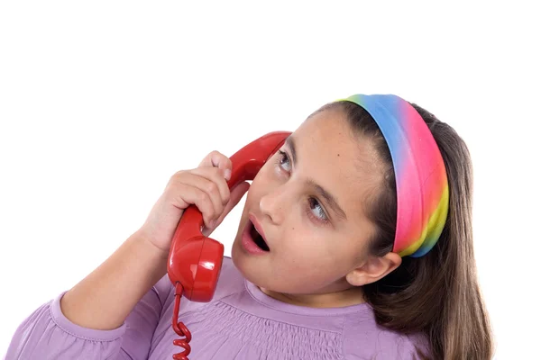 Vacker flicka med röd telefon — Stockfoto