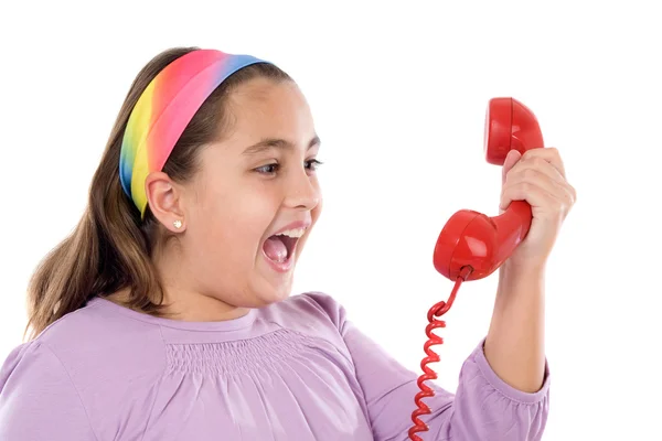 Schönes Mädchen mit rotem Telefon sehr glücklich über gute Nachrichten — Stockfoto