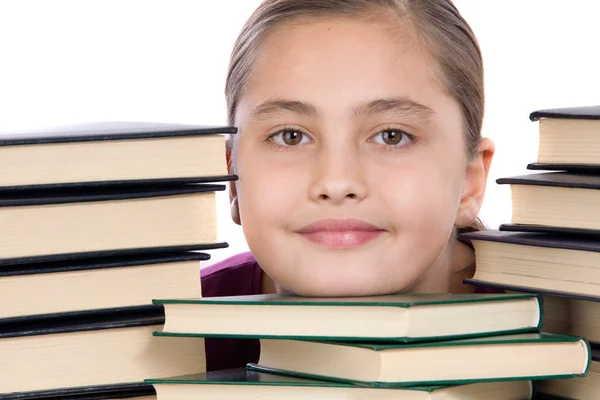 Menina adorável com muitos livros — Fotografia de Stock