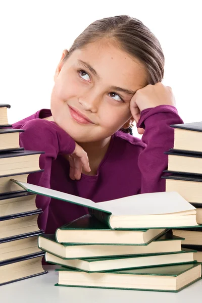 Menina adorável com muitos livros pensando — Fotografia de Stock
