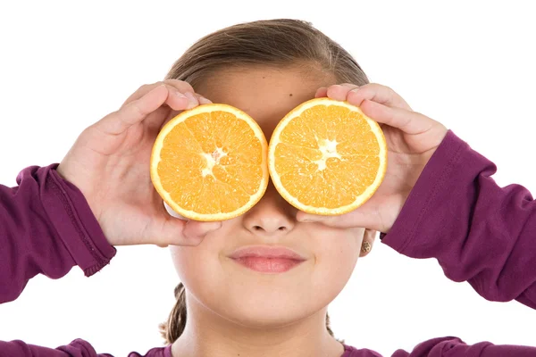 Attraktiva flicka med apelsiner — Stockfoto