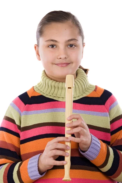 Menina adorável tocando flauta — Fotografia de Stock