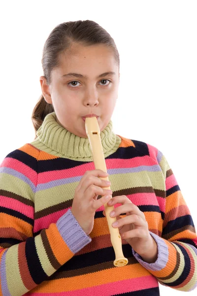 Adorable girl playing flute — Stok fotoğraf