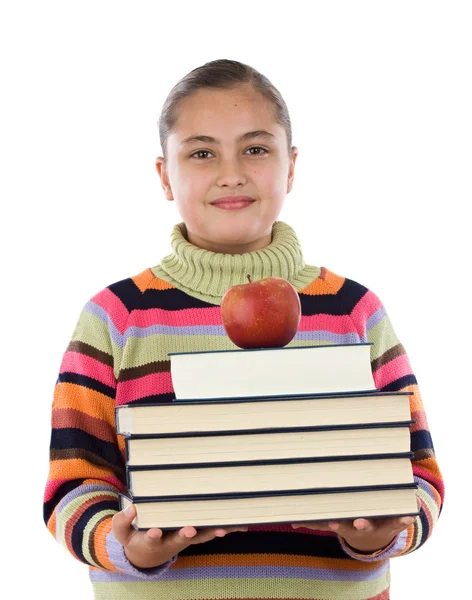 Bedårande flicka med många böcker och ett äpple — Stockfoto