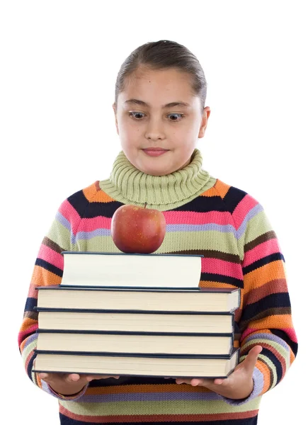 Αξιολάτρευτο κορίτσι με πολλά βιβλία και ένα μήλο — Φωτογραφία Αρχείου