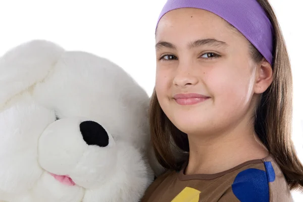 Ona bir oyuncak ayı ile küçük kız — Stok fotoğraf