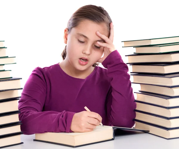 Menina adorável cansado com muitos livros — Fotografia de Stock