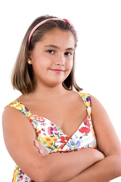 Schattig meisje met bloemrijke jurk — Stockfoto