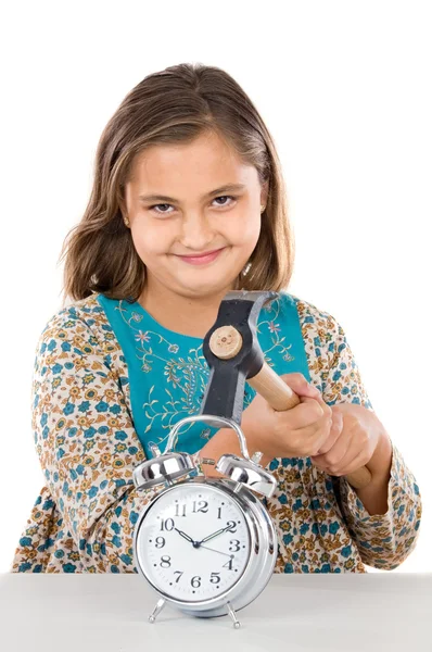Beautiful girl with clock and hammer — Stock Photo, Image