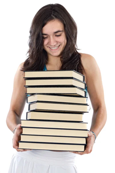 Девушка с грудой книг — стоковое фото
