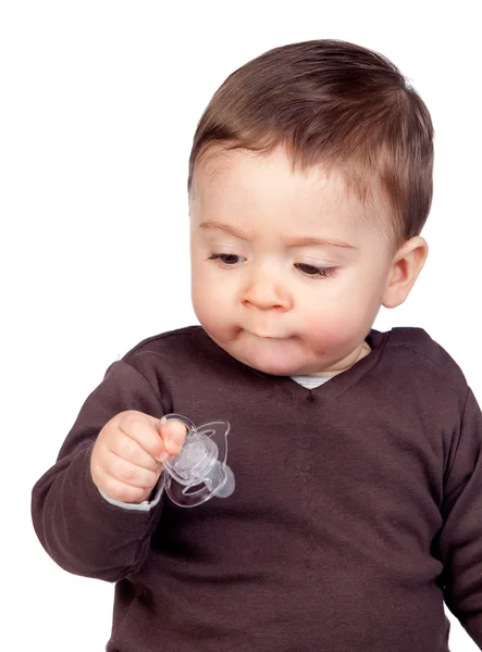 Bebê bonito com uma chupeta — Fotografia de Stock