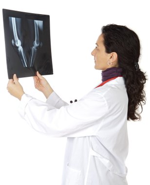 Doctor examining a radiographs clipart