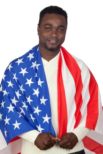 Uomo africano attraente con una bandiera americana — Foto Stock