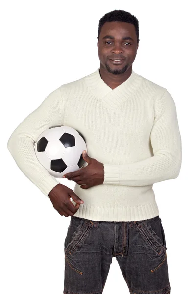 Привлекательный африканский мужчина с футбольным мячом — стоковое фото
