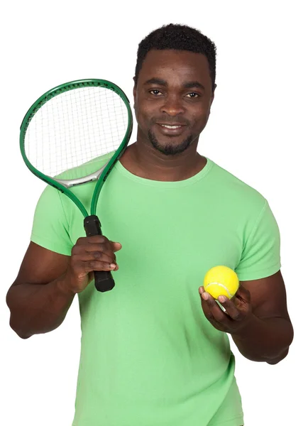 Привлекательный африканский мужчина с теннисной ракеткой — стоковое фото
