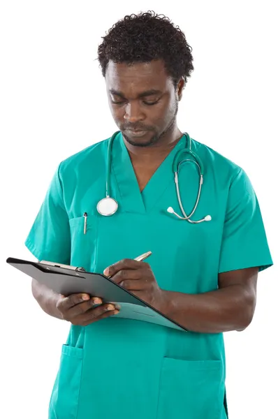 Young black doctor writing — Stock Photo, Image