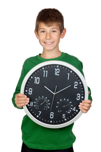 Menino adorável com um grande relógio — Fotografia de Stock