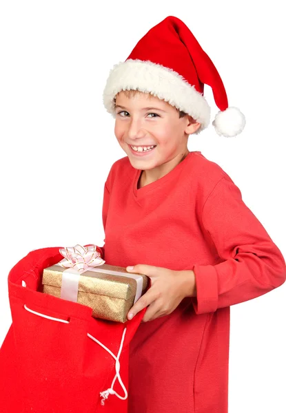 Entzückendes Kind mit Weihnachtsmütze — Stockfoto
