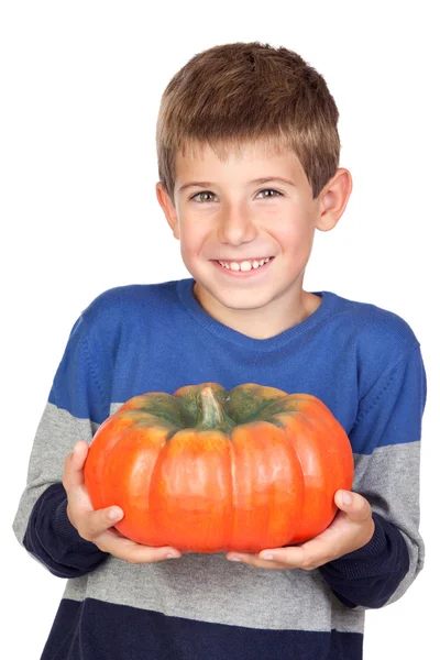 Adorable child with a big pumpkin — Stock Photo, Image