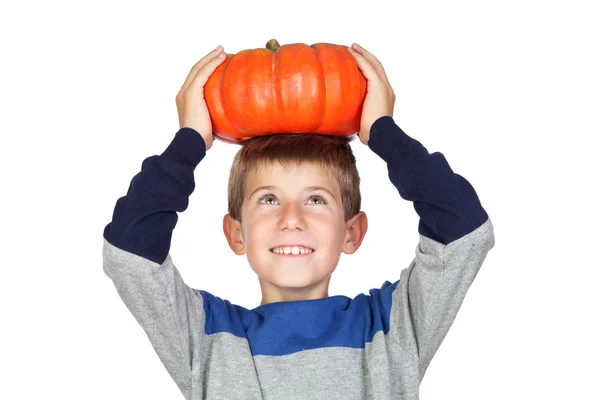 Adorable child with a big pumpkin — Stock Photo, Image