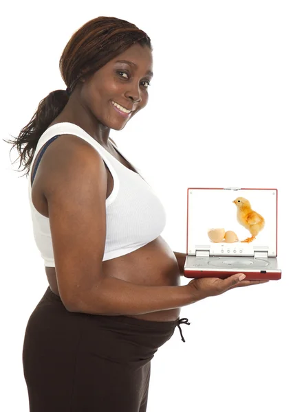 Attractive pregnant woman with a screen — Stock Photo, Image