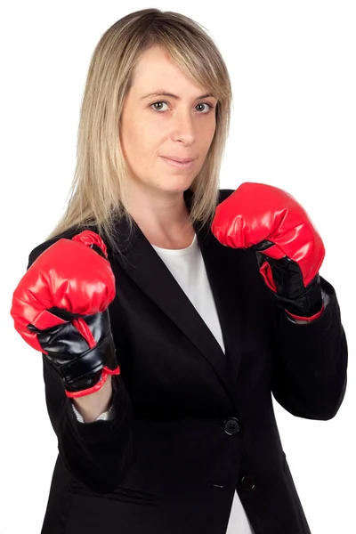 Challenging business woman with boxing gloves — Stock Photo, Image